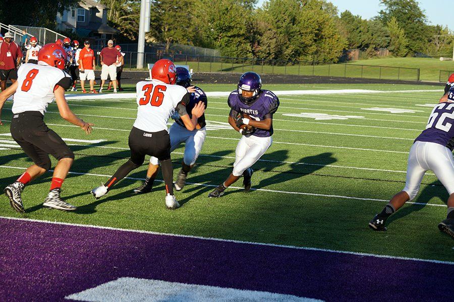 Sophomore Devon Marshall runs towards the endzone. The run was called back, due to a holding call, but, the Pirates still managed to punch it in for the first score of the game.