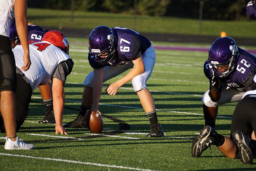 Sophomore David Patrzykont waits to snap the ball. The Pirates will take on the Turner Bears on Monday, at Turner. 