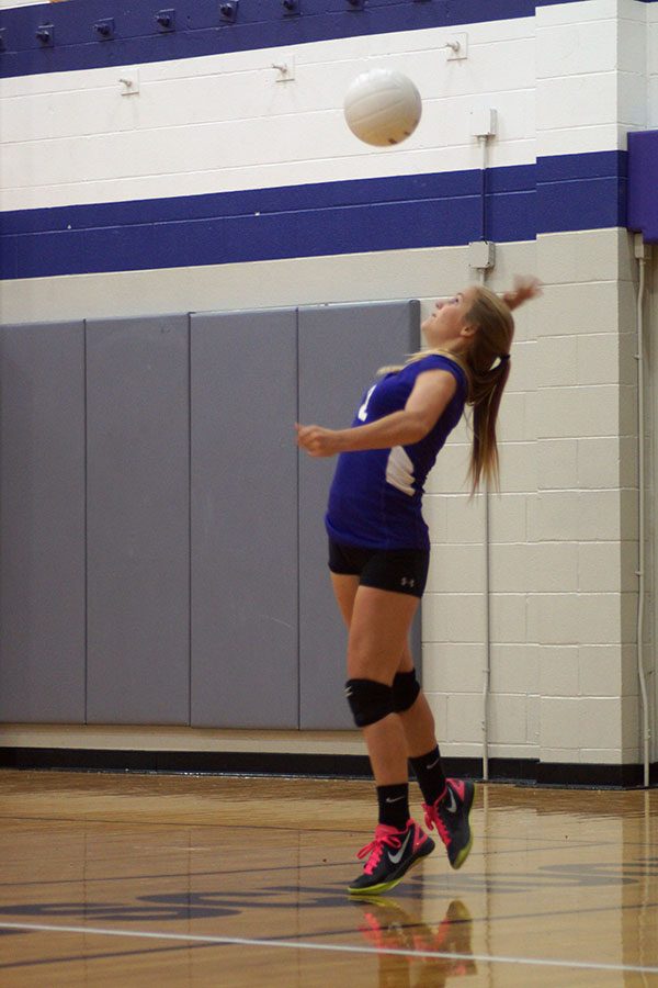 Sophomore Macey Nigh serves to the opposing team.