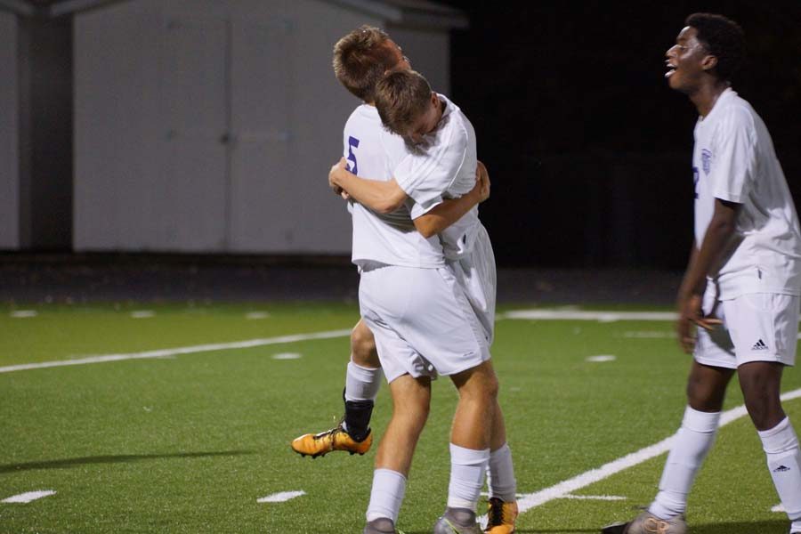 Seniors Christian Snell and Michael King celebrate their win against Eudora Oct. 20.