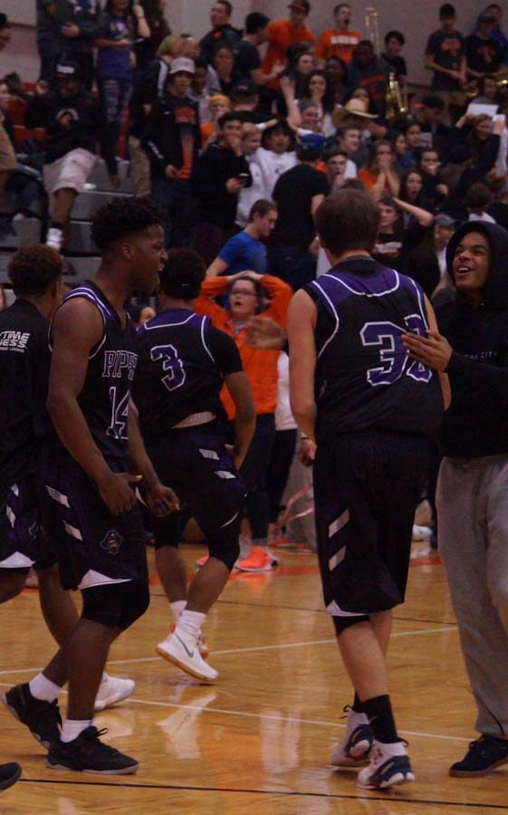 Excitement is stirred as the Pirates celebrate their victory against Bonner.