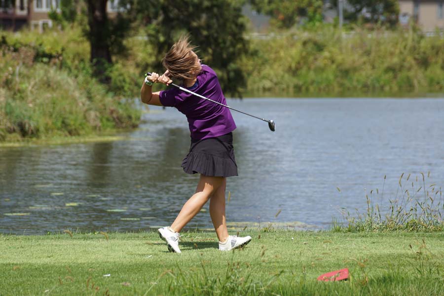 Sophomore Sydney Rhodes finishes driving the ball on September 5th.