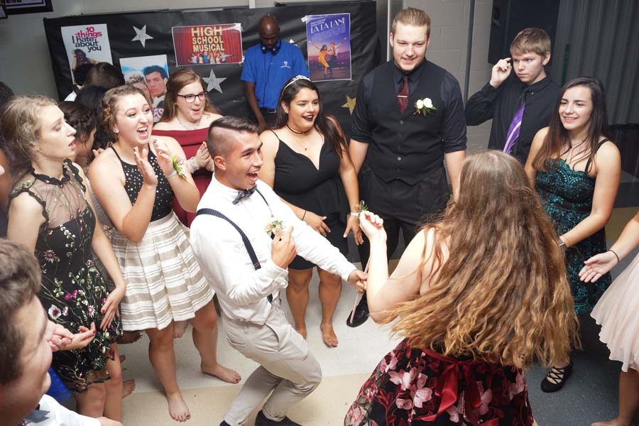 Seniors Isaia Wilcoxen and Maria Accardi take the spotlight in their group and show off their moves.