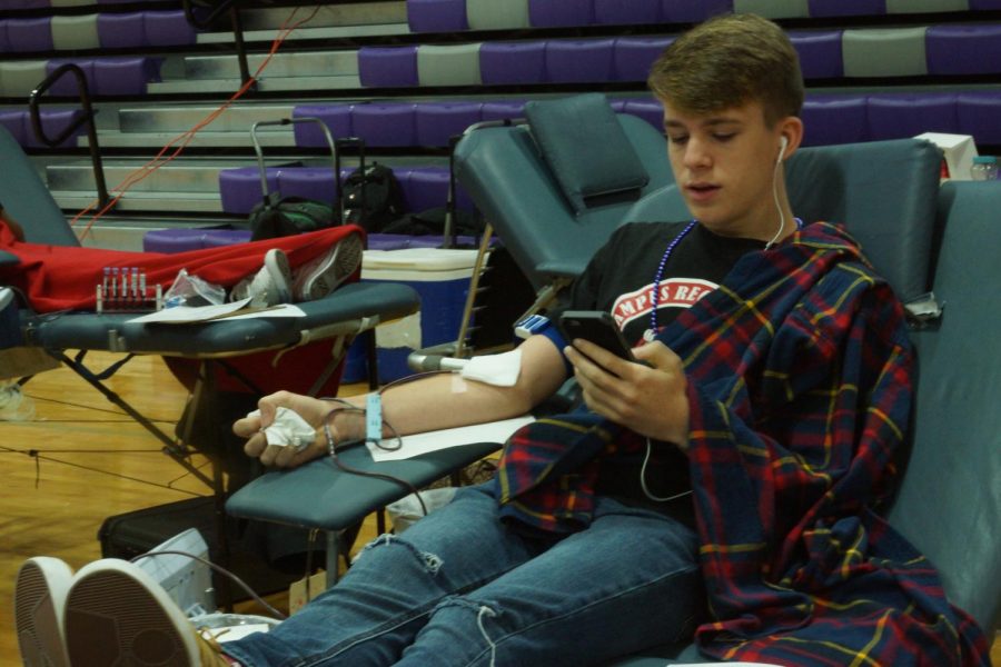 Junior Chris Baumli donates blood last fall.