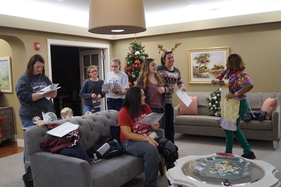 After being done with singing. The members decided to jam out on "Jingle Bell Rock" with the staff at Piper Assisted Living Facility. 
