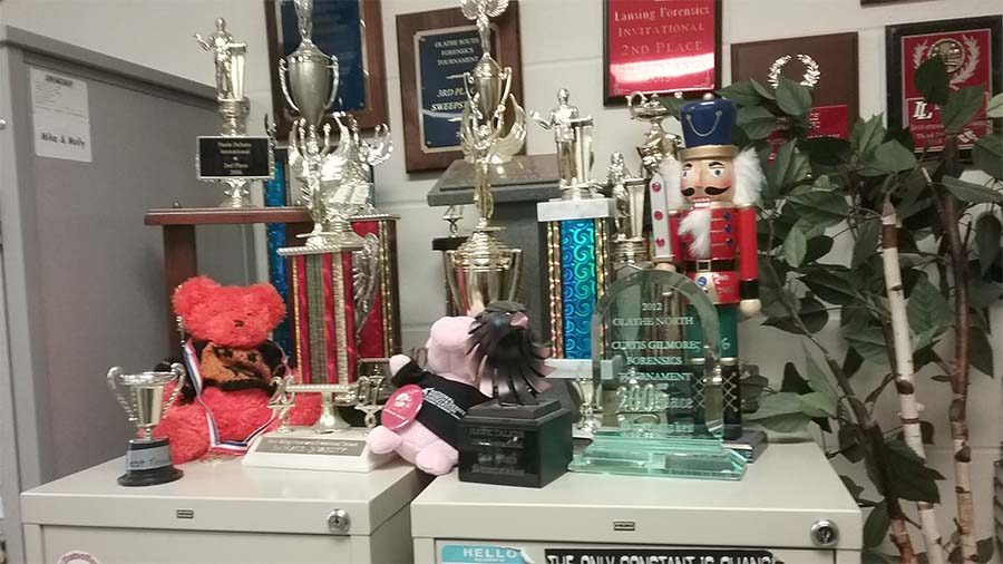Some of the displayed debate awards in coach Tori Deneault's classroom.