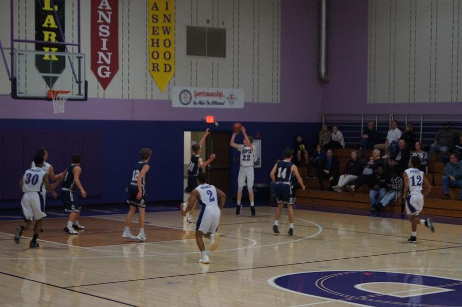 Sophomore Brendyn Bard pulls up for a contested shot in hopes to extend the Pirates' lead over Hayden. 