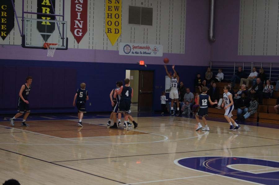 Freshman Jami Tyson shoots an open three-pointer late in the second quarter of the JV game against Hayden. 
