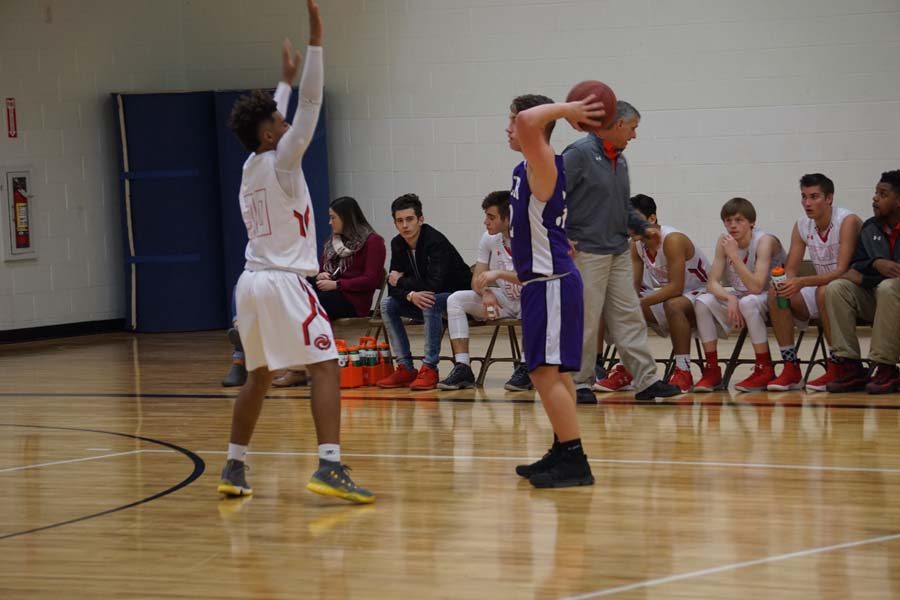 Sophomore Jack Robinson attempts to pass to an open teammate. 