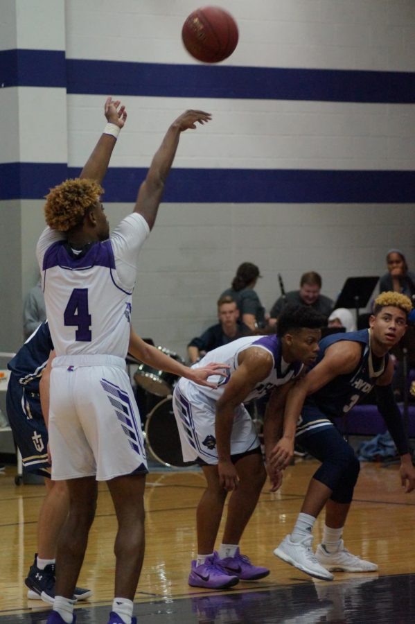 Junior Braijion Barnes shoots a free throw to score for the pirates, increasing their lead against Topeka Hayden