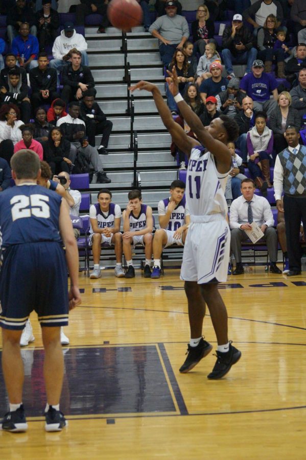 Junior Trey Bates sinks free throw.