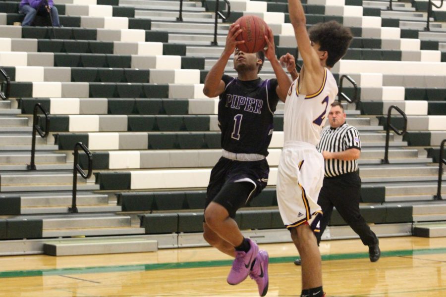 Senior Doc Covington gets fouled on a layup to the basket.