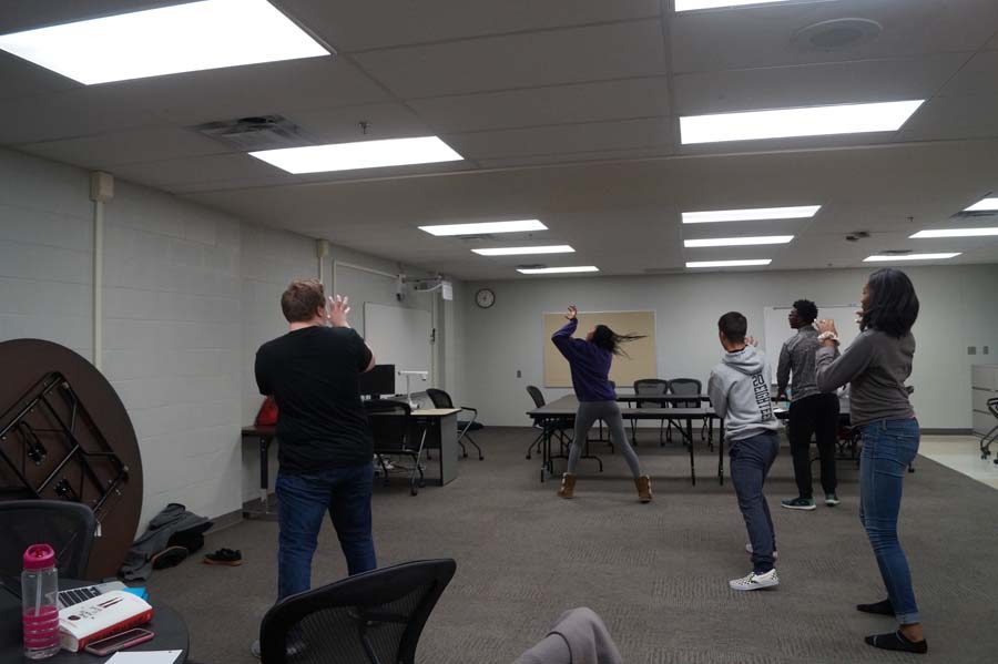 The students put on music to drown each other out while everyone practiced their piece. As Michael Jackson's "Thriller" comes on, all the forensicators stopped and started to dance.