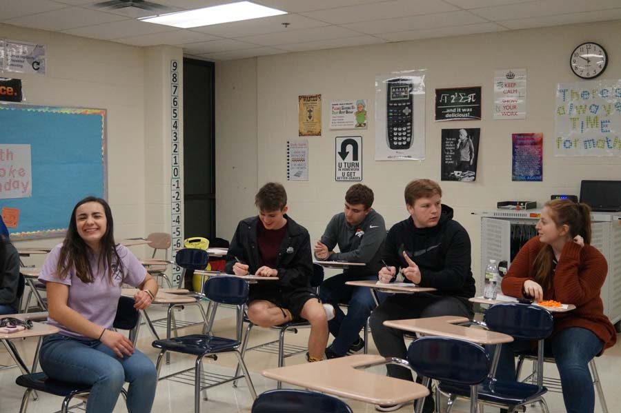 The lock in is held in part to bring the team together, but also to get the first years experience with tournaments. The judges and advanced students take their seats to listen to the first years perform for the first time.
