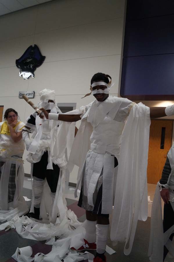 Senior Marcus Wallace and his team make "Marcacus" a gladiator costume from toilet paper and masking tape. They also won part of the contest.