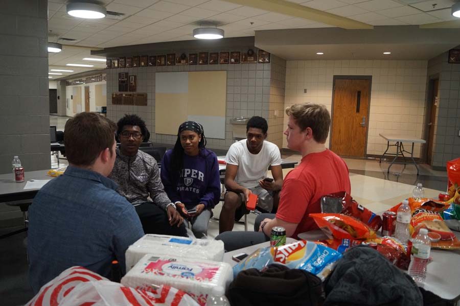 Alumni come back to provide advice and help the high schoolers. They all just eat and hang out while talking about their pieces.