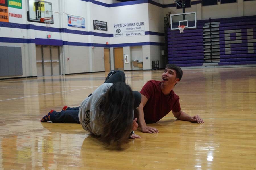 Senior Isaia Wilcoxen and Junior Ally Vierra perform a Impromptu Duo for the students at 4am for a contest among the other students. 