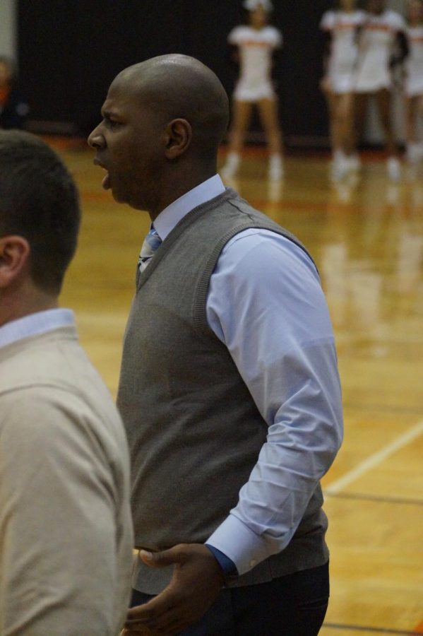Varsity coach Toure Grimes questions a call from the refs against Bonner Jan. 12.