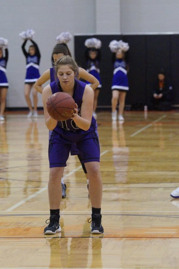 Senior team captain Mary Rogers sets up to shoot a free throw Jan. 12.
