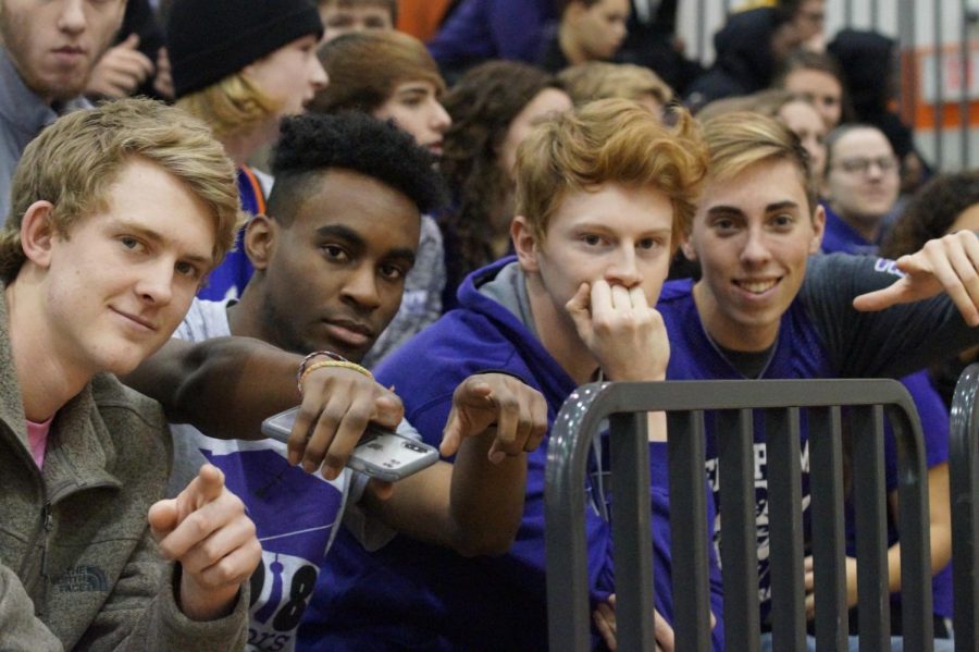 Senior boys pose for a photo while watching the varsity girls continue their undefeated streak Jan 12. against the Bonner Braves.