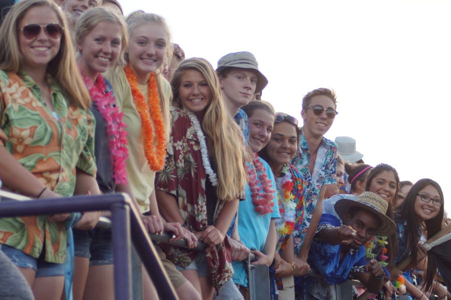 Seniors take the lead at home games, filling the front rows and keeping school spirit high. The Pirates hosted Lansing in football Sept. 22, and the student section theme was Hawaiian.