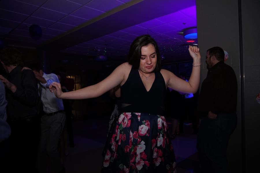 Senior Kara Evans leads her last tango line in high school while dancing to September by Earth, Wind, and Fire.