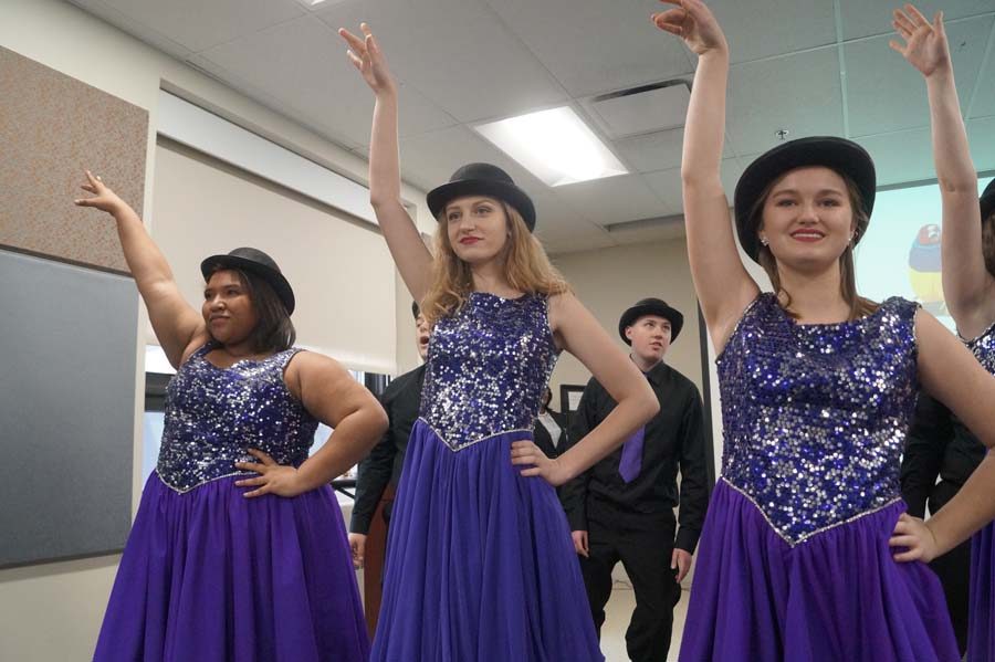 Seniors Alena Riley, Sydney Sheldon and Riley Kirwan along with the rest of Music n' Motion perform "Feelin' Good" for the audience at the VA hospital. The audience seemed to have loved the upbeat jazz song, along with how well it fit into the celebration.
