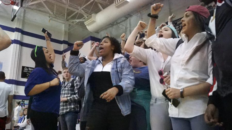 The seniors cheer during the Pirate countdown at the courtwarming pep assembly Feb. 9. 