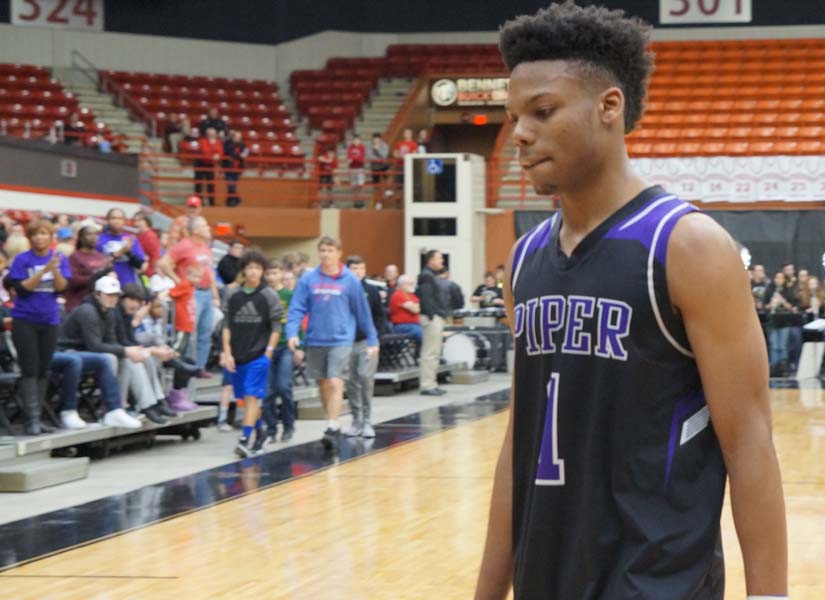 Senior Doc Covington exits the court for the last time as a player in high school. Leading the team to it's second time at state in the last two years.