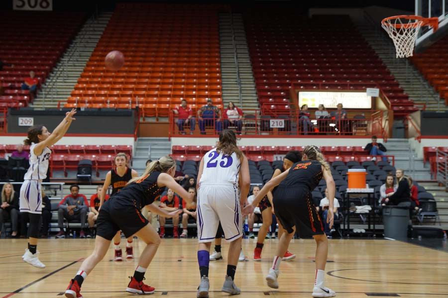 Freshman starter Evelyn Vazquez shoots her second free throw. Vasquez scored the first six points in the game against Labette County March 10.