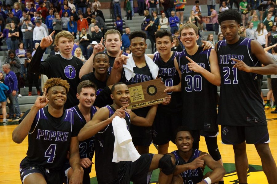 The Pirates pose for a photo after winning the sub-state game against Basehor