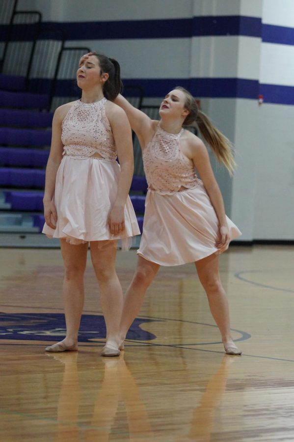 Senior Hannah Haworth and sophomore Morgan Hawworth share their heartfelt duo, "I will wait" with the crowd.