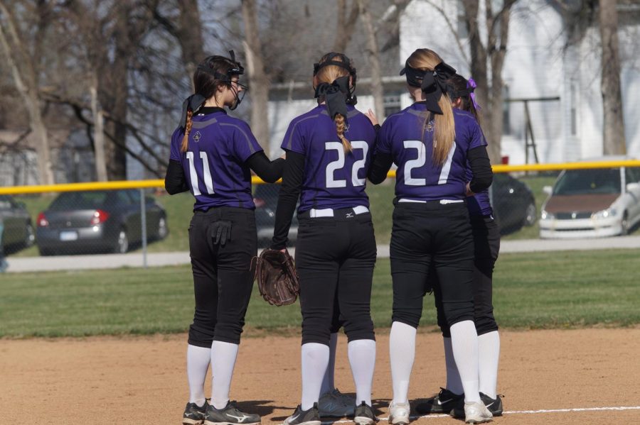 JV Pirates discuss their game plan for the inning before they defeat Ottawa, April 17