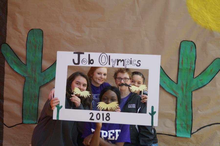 After lunch the students all get together for a photo. They played in the photo booth and with balloons in the gym before returning for awards.