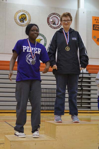 After practicing for Job Olympics both Caitlyn Lake in first and Laqwanza Wiliams in second beet out all the other contestant in the condiment sorting. Together they took the stage and stood in front of all the schools in recognition.