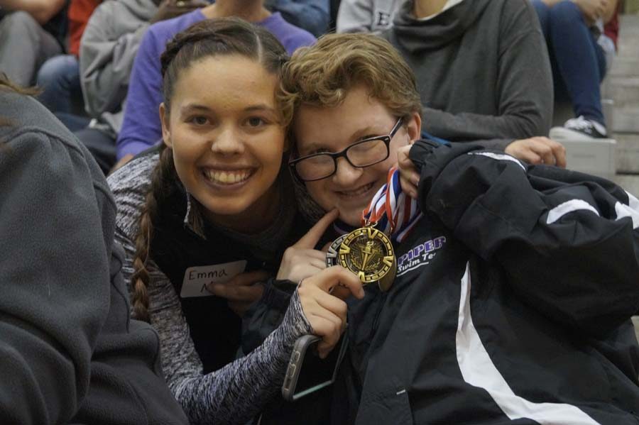 Caitlyn Lake and partner Emma Morgan celebrate the 3 medals Caitlyn won at Job Olympics. After lots of hard work and teamwork it all paid off in the end.