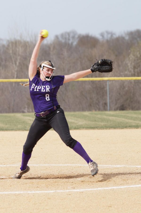 Senior Makayla Stack pitches a strike to the Basehor Bobcats.