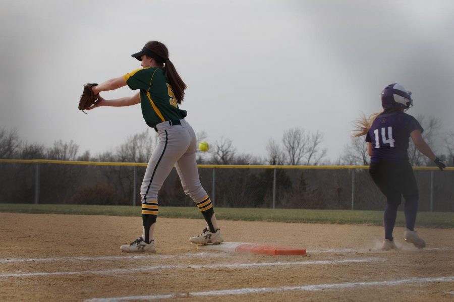 Junior Macey Nigh secured first and second base after the first baseman dropped the ball.