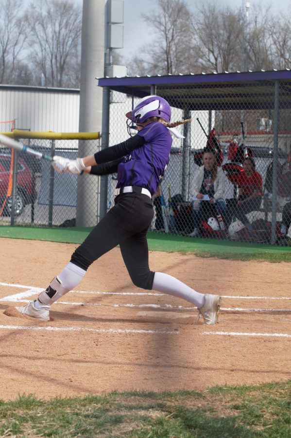 Senior Emma Golden hits a pop fly ball to center field, April 17
