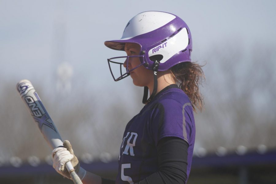 Junior Grace Banes prepares to hit a ground ball earning the pirates another run