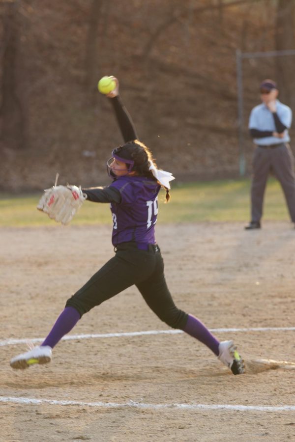 Sophomore Chloe Rogers pitches the ball to strike out Bishop Ward