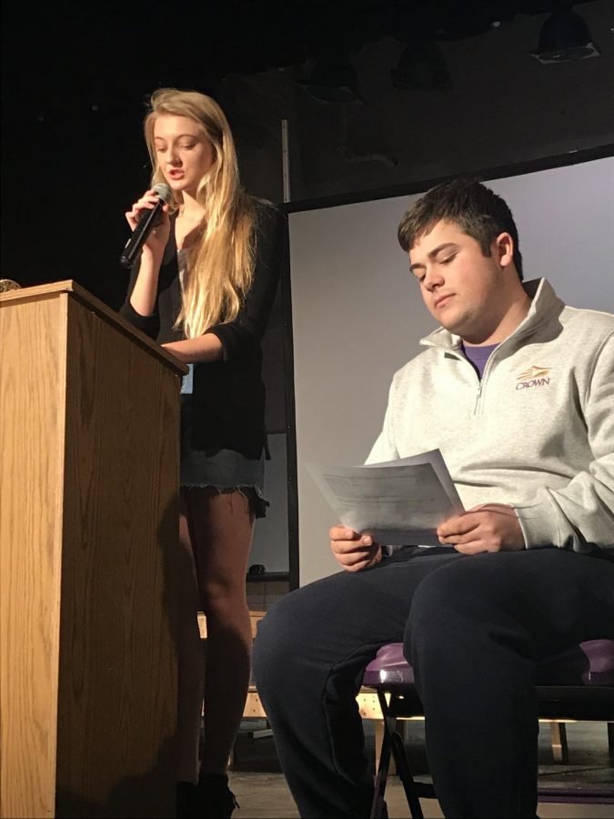 Senior Key Club president Elle Blake opens the April meeting as president elect junior Drew Novak listens.