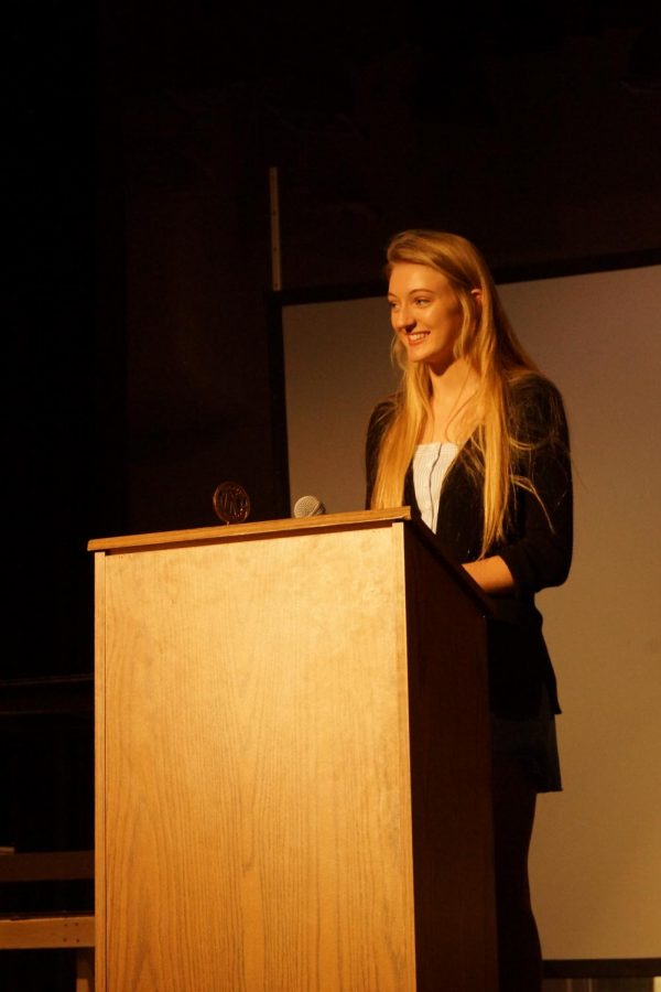 President Elle Blake completes her last meeting as Key Club president.