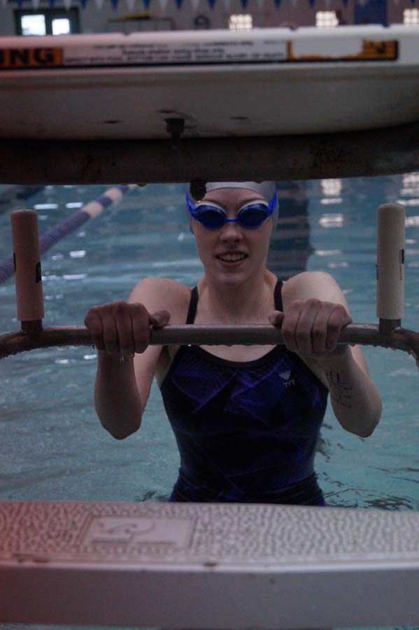 Freshman Anna Ringel gets ready to start her 100 backstroke.