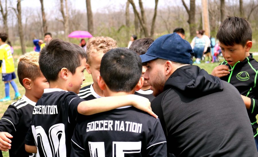 The coach of the Soccer Nation U-8 team.