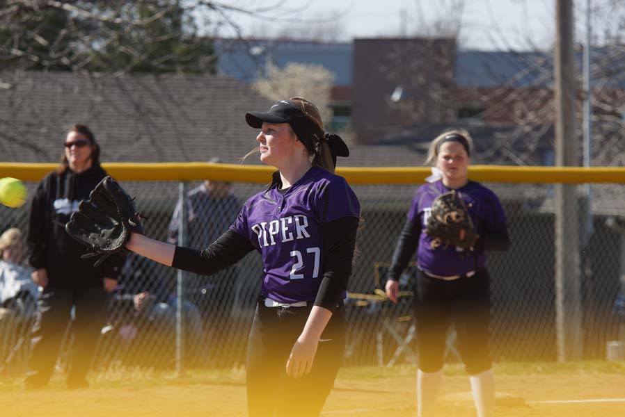 Sophomore Daley Beashore catches the ball after she pitches against Desoto April 19.