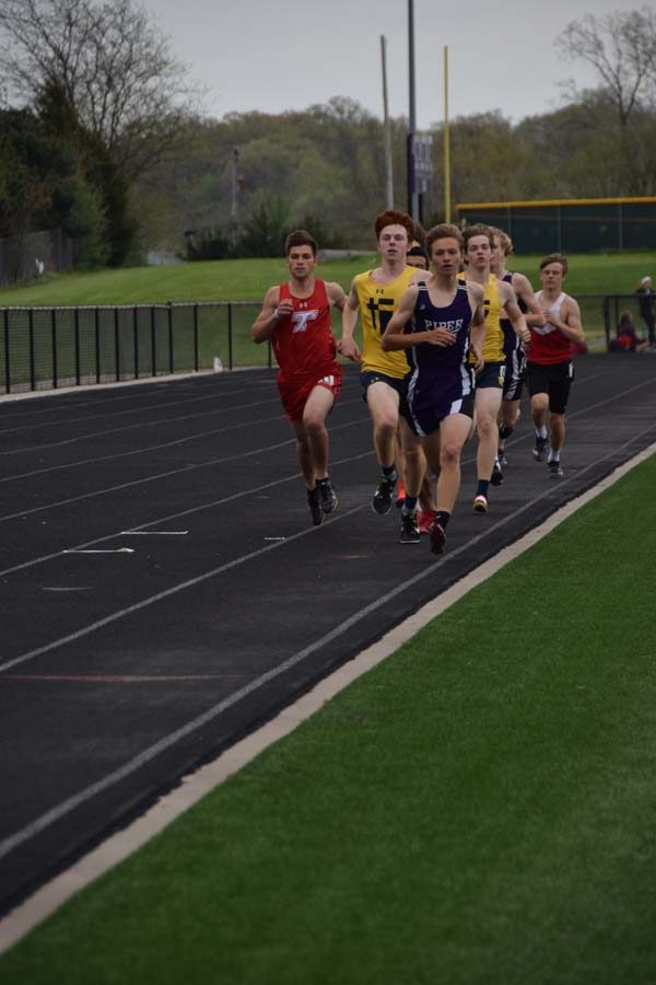 Junior Johnny Moon takes the lead in the 800m.