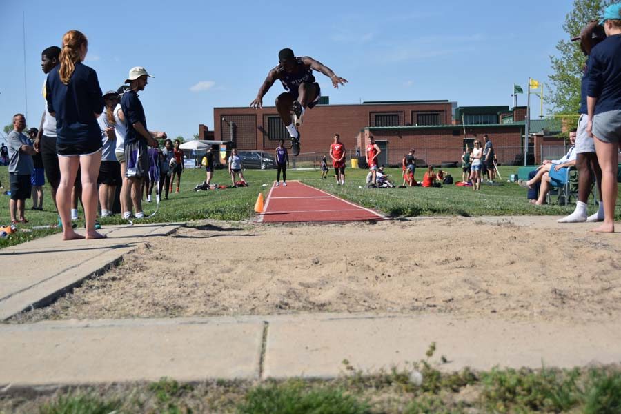 Junior DaMeon Weathers long jumps at the KVL League. 