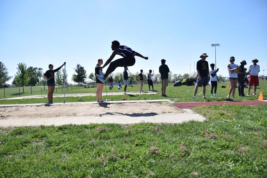Sophomore Miles Lockridge long jumps for the first time of the 2018 KVL Leauge meet. 