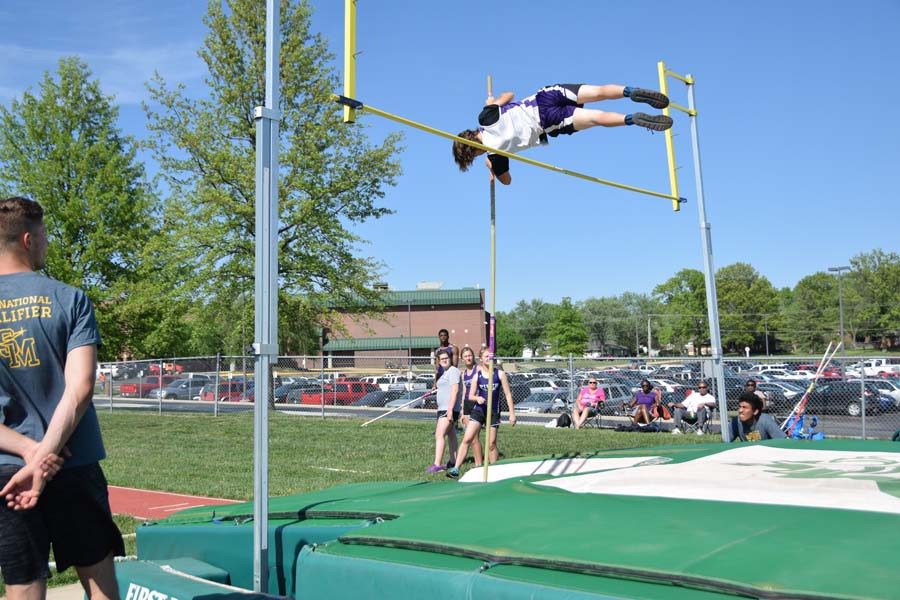 Freshman Chase Lee clears the height of 11 feet in finals and places third. 